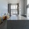 a kitchen with a large marble counter