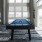 a pool table in a room with ample lighting from large windows