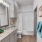 a bathroom with a tub sink and toilet